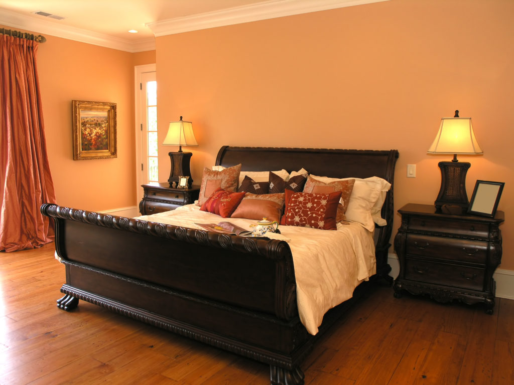 nice bedroom with sleigh bed in dark wood